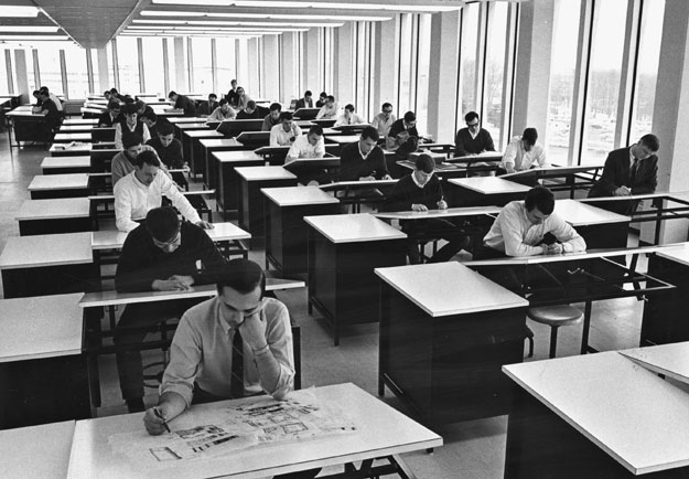 Architecture students hard at work at drafting tables at MIT in 1898.