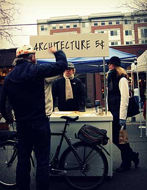 After getting laid off, John Morefield set up an advice booth at a farmers’ market in Seattle.